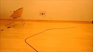 Rolling Spider micro-drone executing closed-loop visual path tracking along yellow floor-marked trajectories. | Watch Full Video Demonstration on YouTube ↗ | https://www.youtube.com/watch?v=f5l8GA1PHm8#no-embed