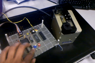 68HC11 Microcontroller Board and Mechanical Gripper hardware loops.