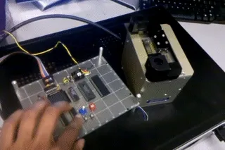 68HC11 Microcontroller Board and Mechanical Gripper hardware loops.